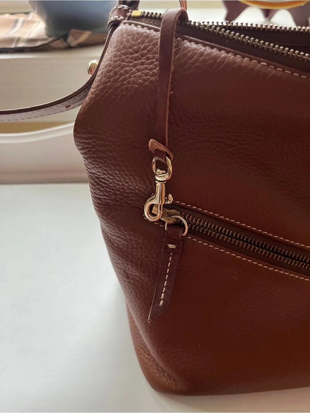 Dooney & Bourke Dark Brown Leather Messenger Bag with Brass Accents